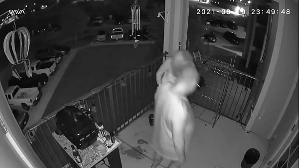 Couple caught on the balcony