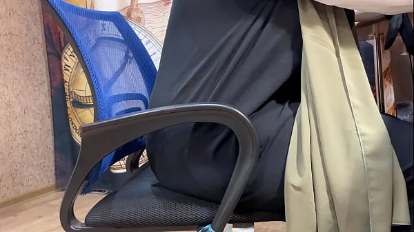 Arab woman in hijab masturbates through her panties while working